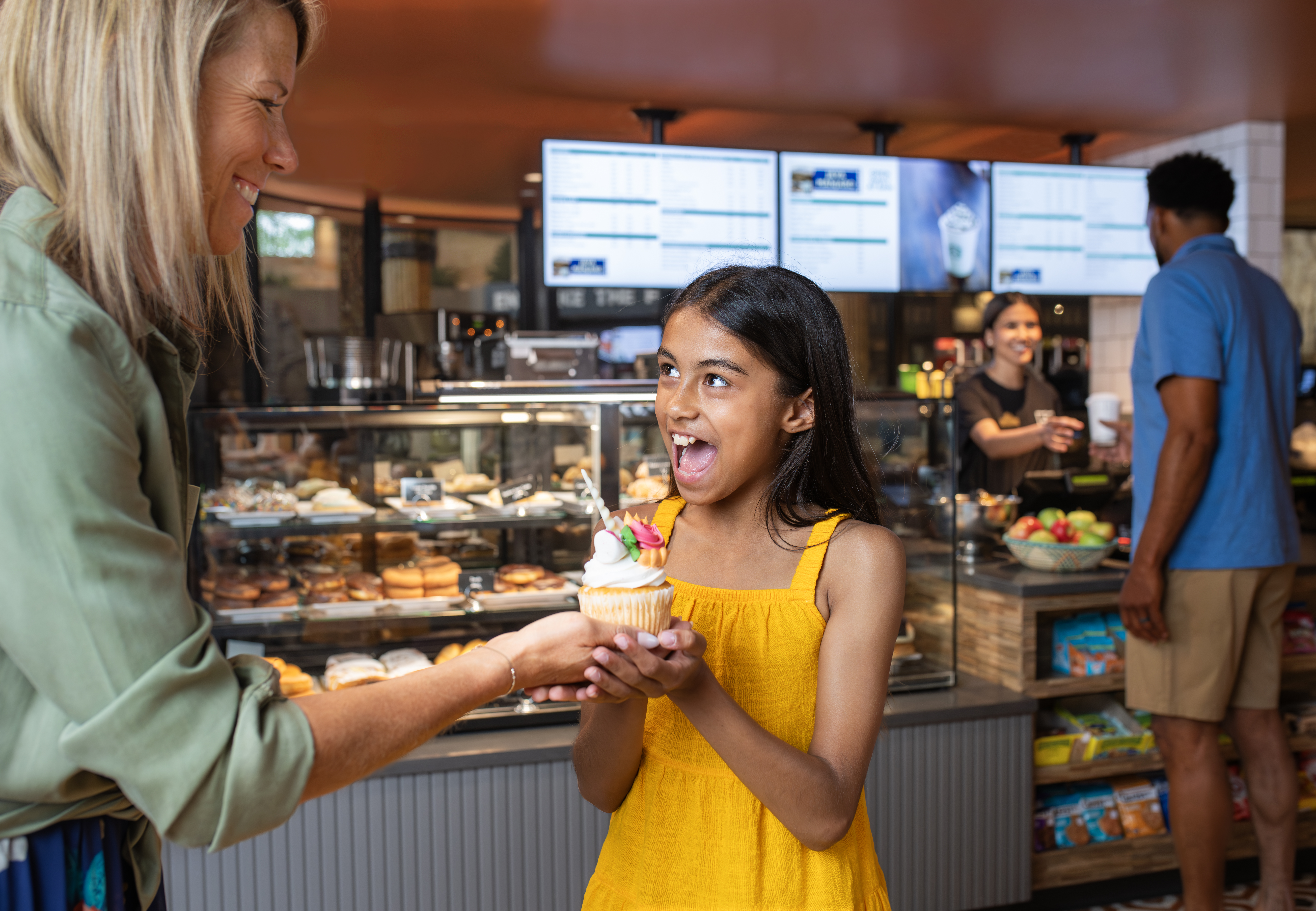 girl with a sweet treat from the cafe
