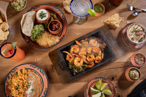Table full of delicious modern Mexican cuisine at Cinco Niños
