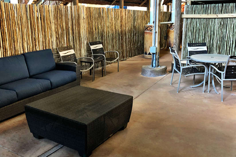 Overview of the Riverview cabana. Includes table, chairs, tv, and a couch. It's by the lazy river. Overview of the Riverview cabana. Includes table, chairs, tv, and a couch. It's by the lazy river.