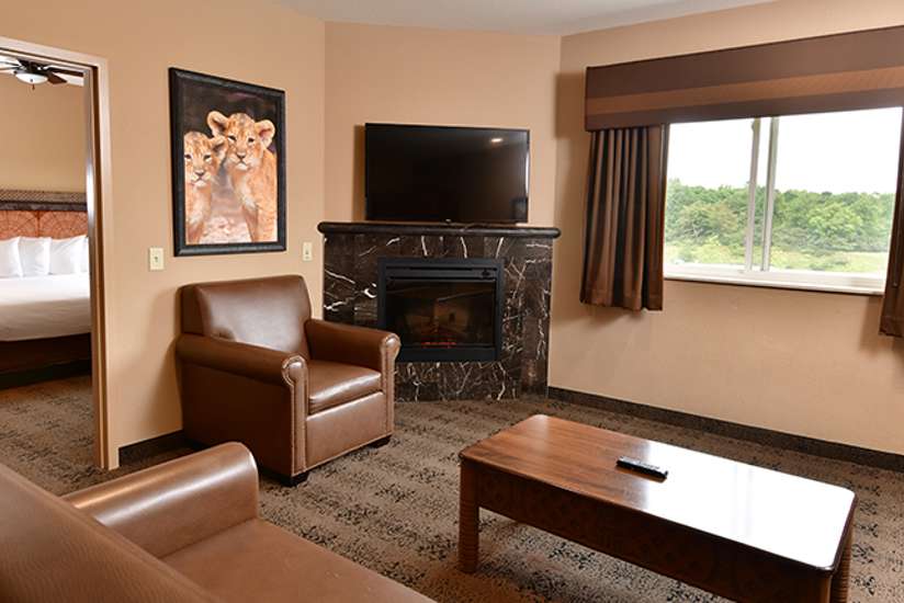 an overview of inside the 3 Bedroom Family Suite. Consists of a bathroom and a dining area