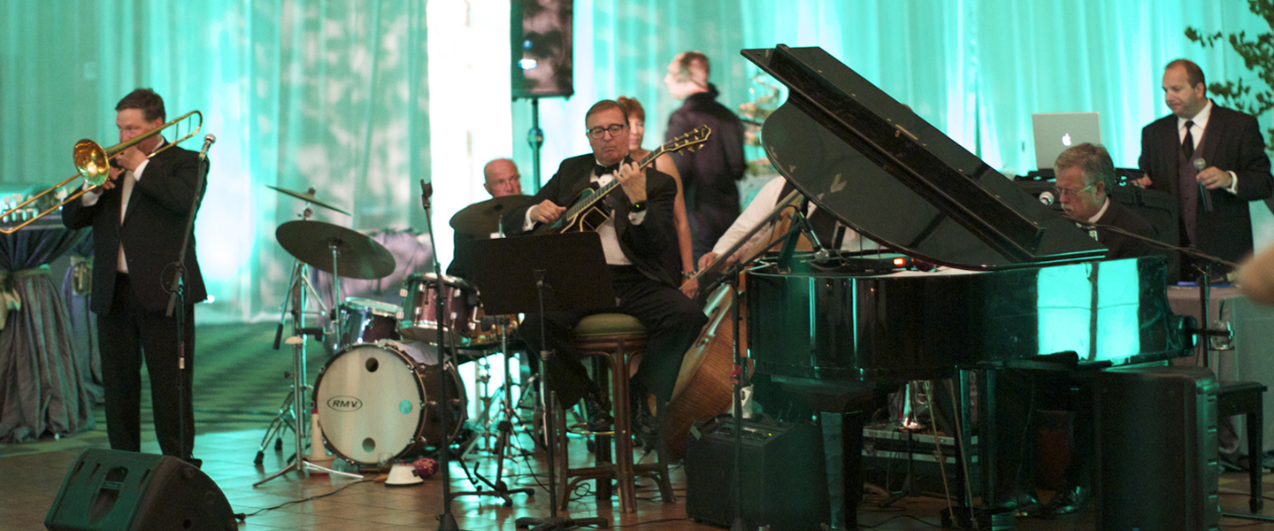 band performing at a wedding in the conventions center
