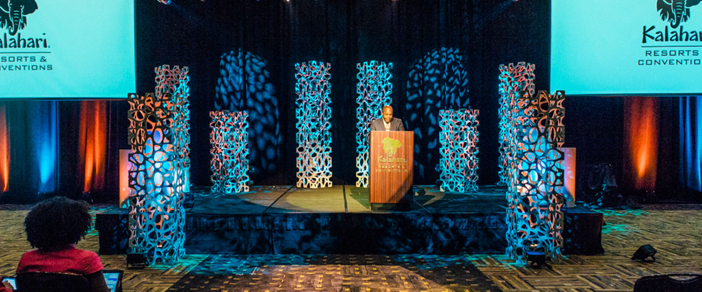 someone giving a speech in the convention center