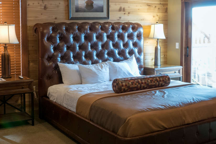 an overview of the Waterfront Retreat's bedroom with bed