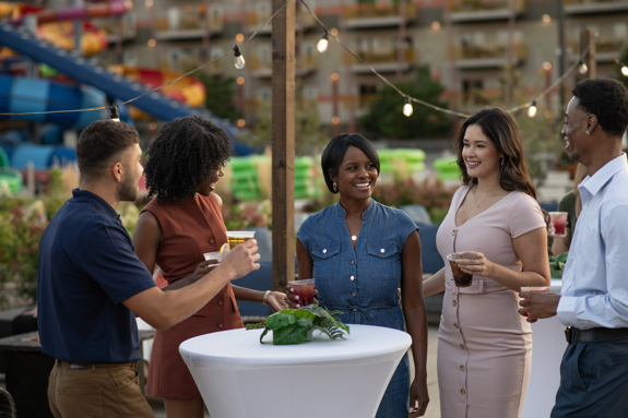 people meeting at outdoor happy hour