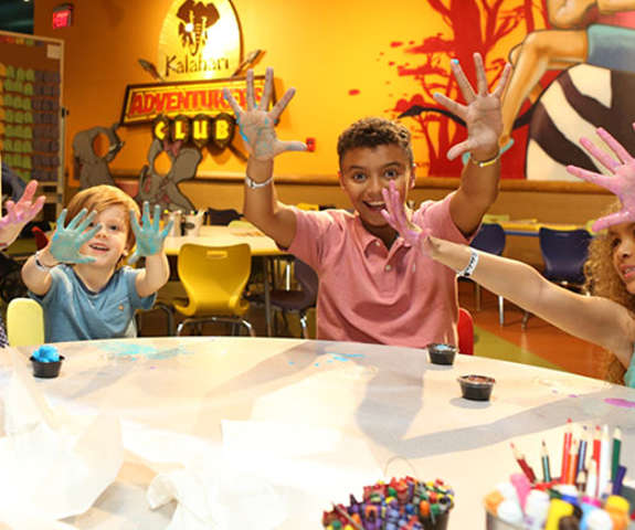 a group of kids making some slime in the Adventurers Club