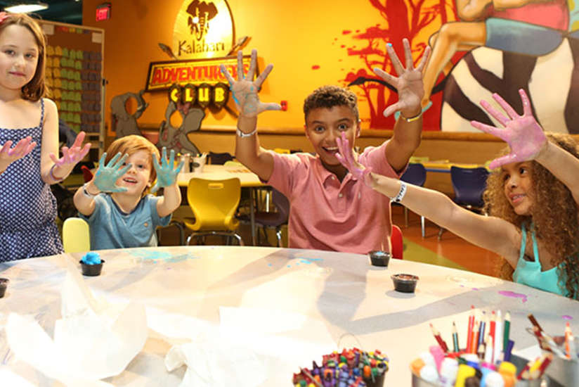 a group of kids making some slime in the Adventurers Club