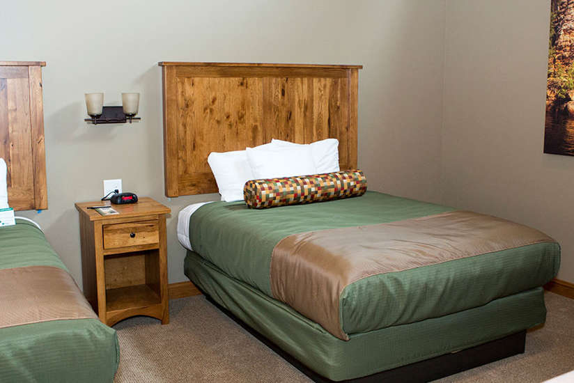 an overview of the Cottage's bedroom with two beds