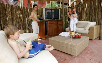 a family relaxing in the cabana