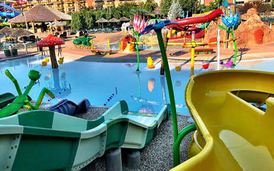 bugs burrow kids area in the outdoor pool area. Filled with waterslides, giant bug statues, and kids having a blast!