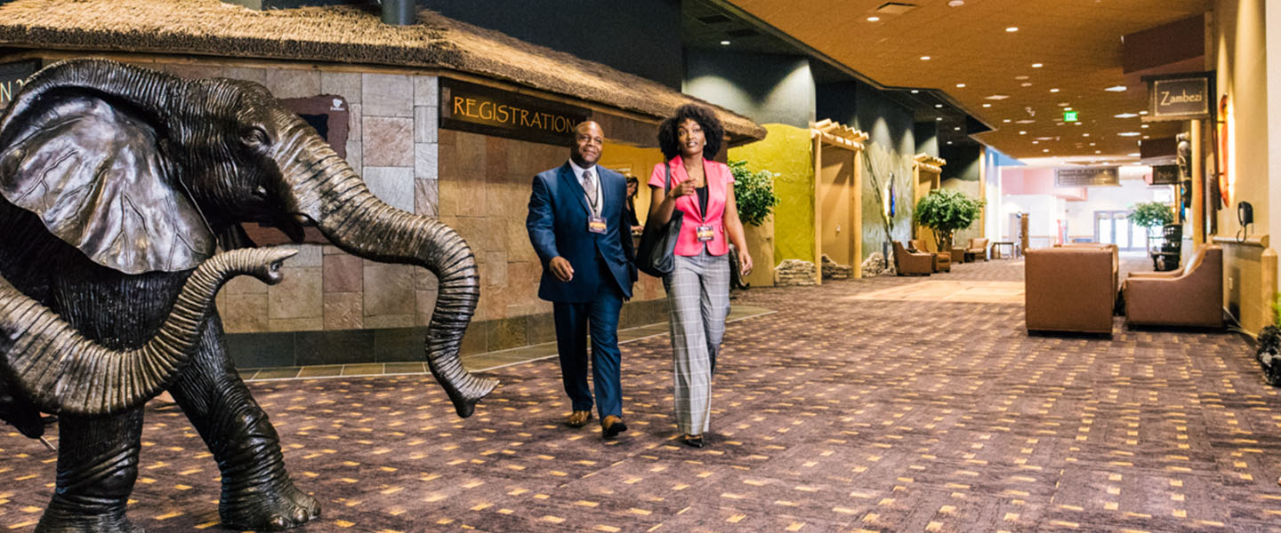 two people walking inside our convention center