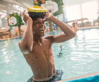 Boy finishing with the underwater DiVR experience.