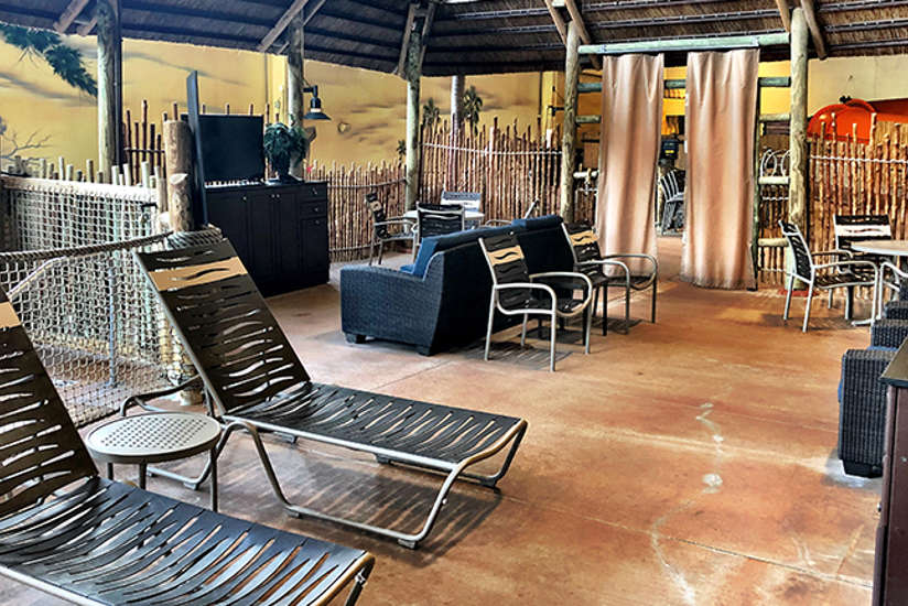 an overview of the wave view cabana. It includes a tv, lots of chairs chairs, couch, private whirlpool oasis, and tables. an overview of the wave view cabana. It includes a tv, lots of chairs chairs, couch, private whirlpool oasis, and tables.