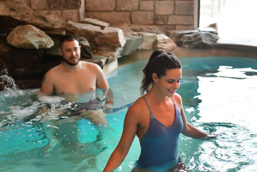 Couple enjoying the day spa pool together. Couple enjoying the day spa pool together.