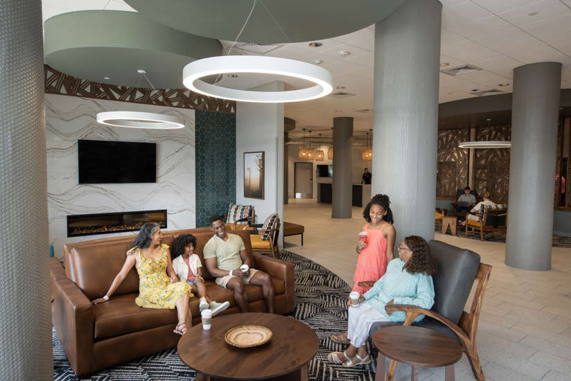 family hanging out together in the hillside lobby