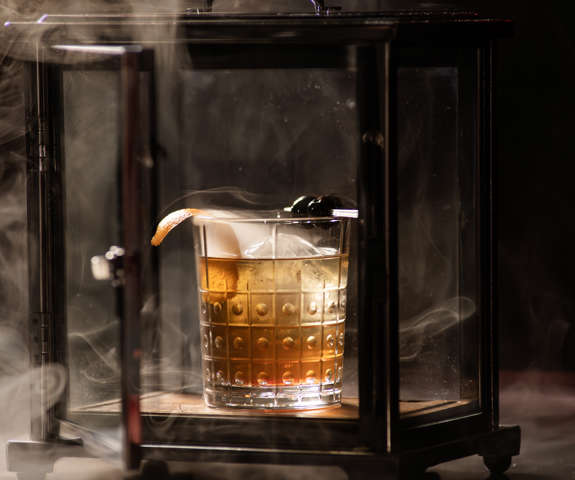 Cherry smoked old fashioned in the smoker