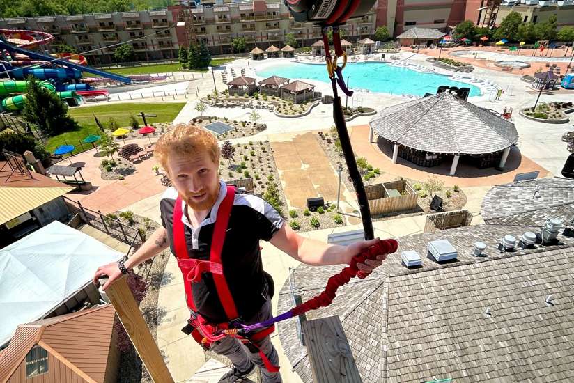 Guy ready to jump on free fall tower