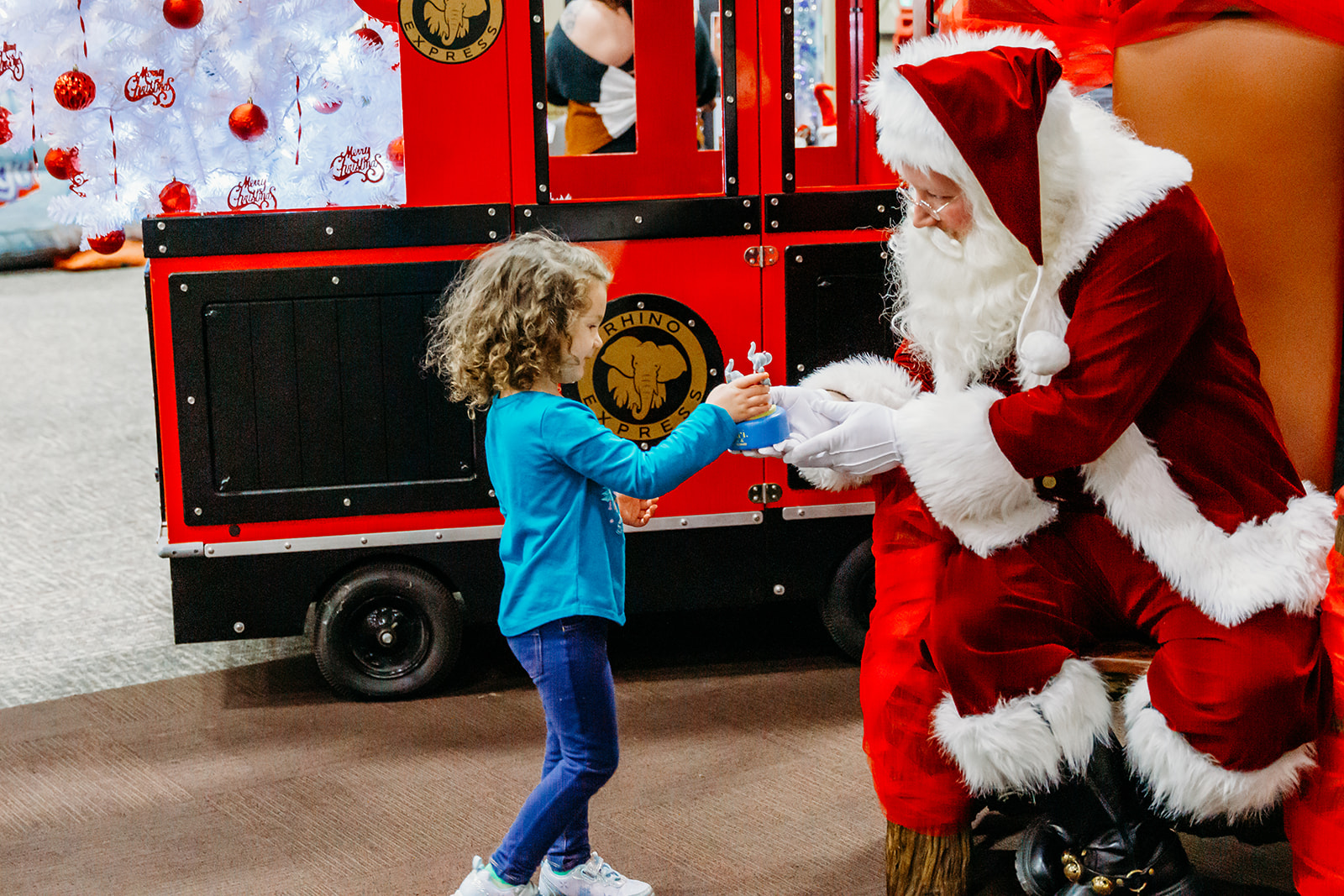 Girl interacting with Santa