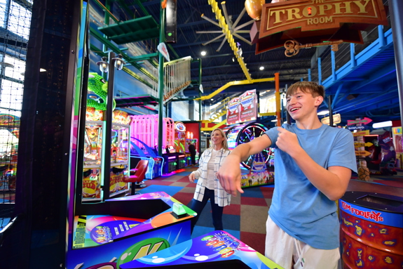 Mom and son competing in the arcade