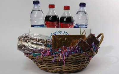 a candy, chocolate, water and soda basket from Candy Hut