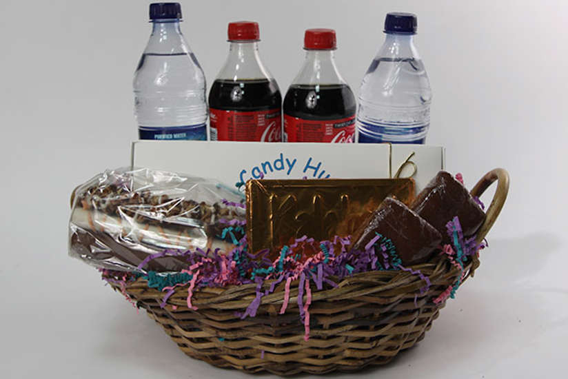 a candy, chocolate, water and soda basket from Candy Hut