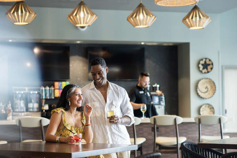 Couple enjoying a cocktail at the bar