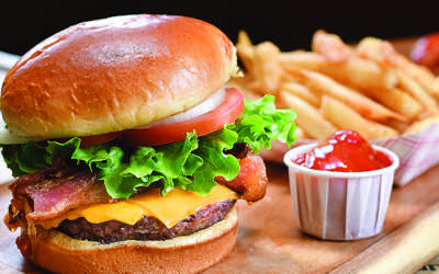 a burger and fries from safari snacks inside kalahari resorts & conventions