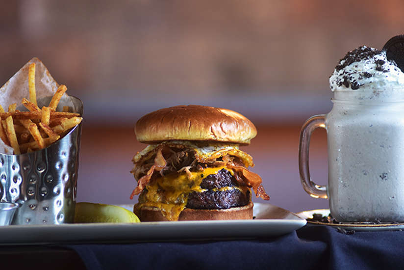 Crispy fries, a big juicy burger with egg and bacon, and a delicious oreo shake from B-Lux Grill & Bar Crispy fries, a big juicy burger with egg and bacon, and a delicious oreo shake from B-Lux Grill & Bar