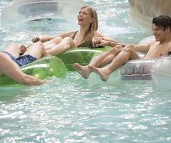 Family floating through the lazy river.