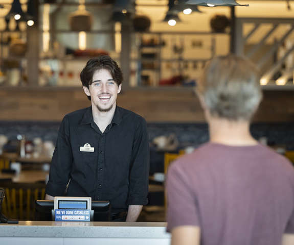 Host ready to seat you at your table