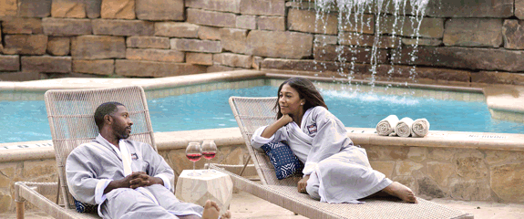Couple enjoying the outdoor day spa lounge area at Spa Kalahari