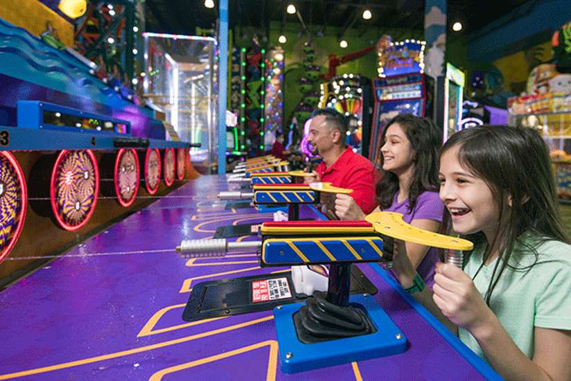 Family Playing the Arcade