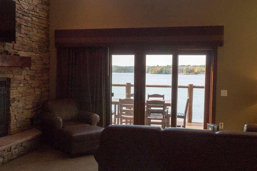 an overview of the Waterfront Retreat's living room with fireplace and tv