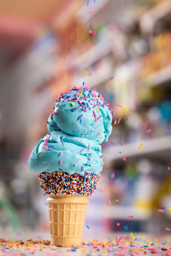 Ice cream cone with sprinkles on top