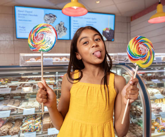 girl with lollypops