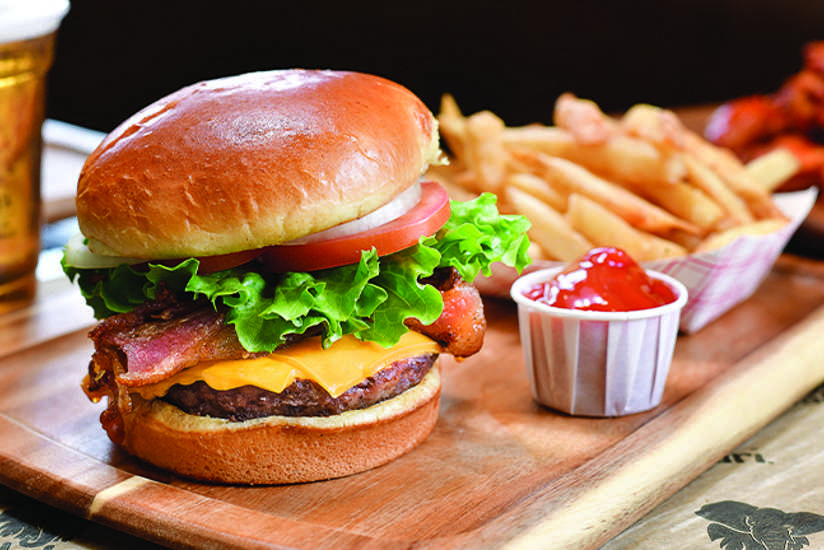 a burger and fries from safari snacks inside kalahari resorts & conventions