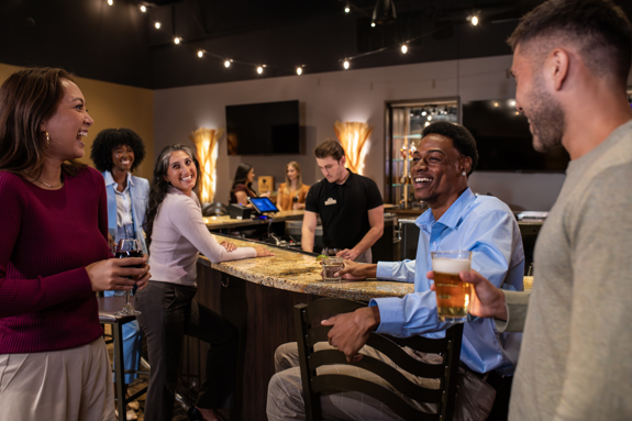 people enjoying happy hour