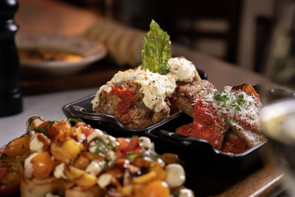Housemade meatballs, tomato bruschetta, sausage, peppers